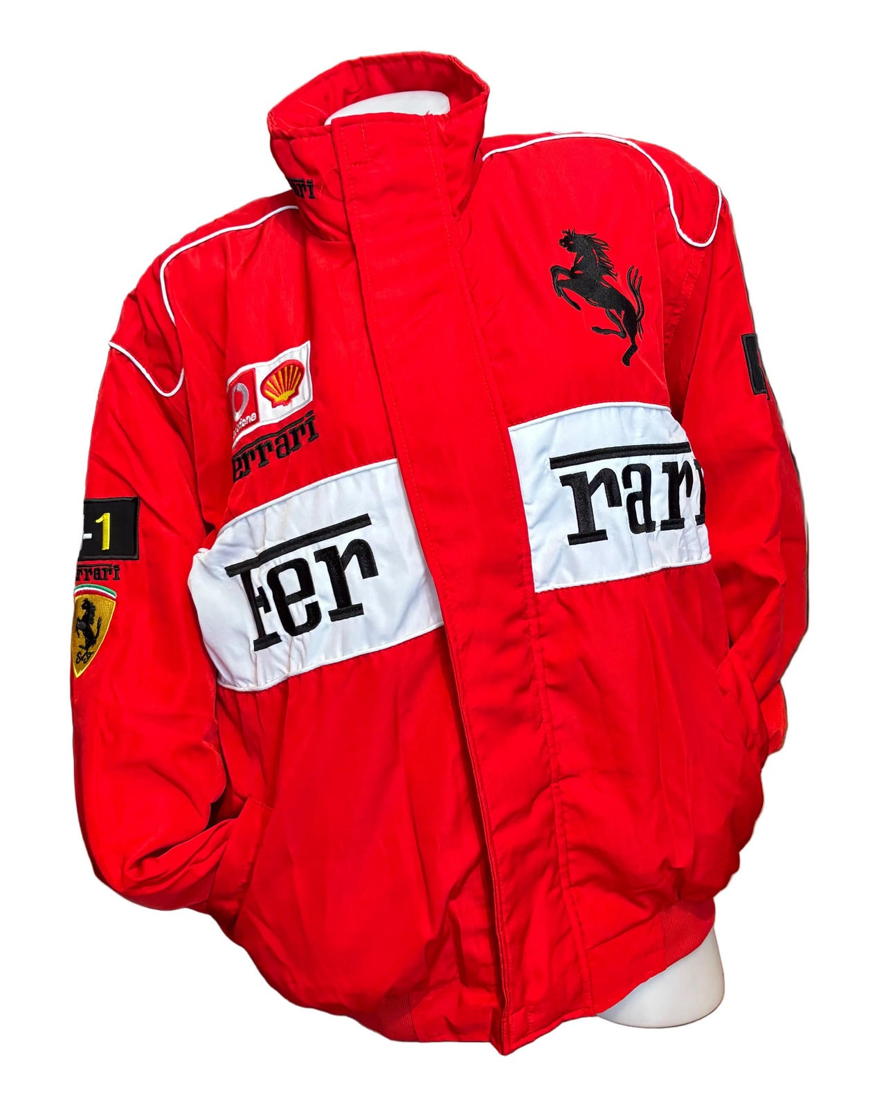 Red Ferrari jacket by Model Express Vancouver displayed on a hanger with a sleek design and Ferrari logo detail.