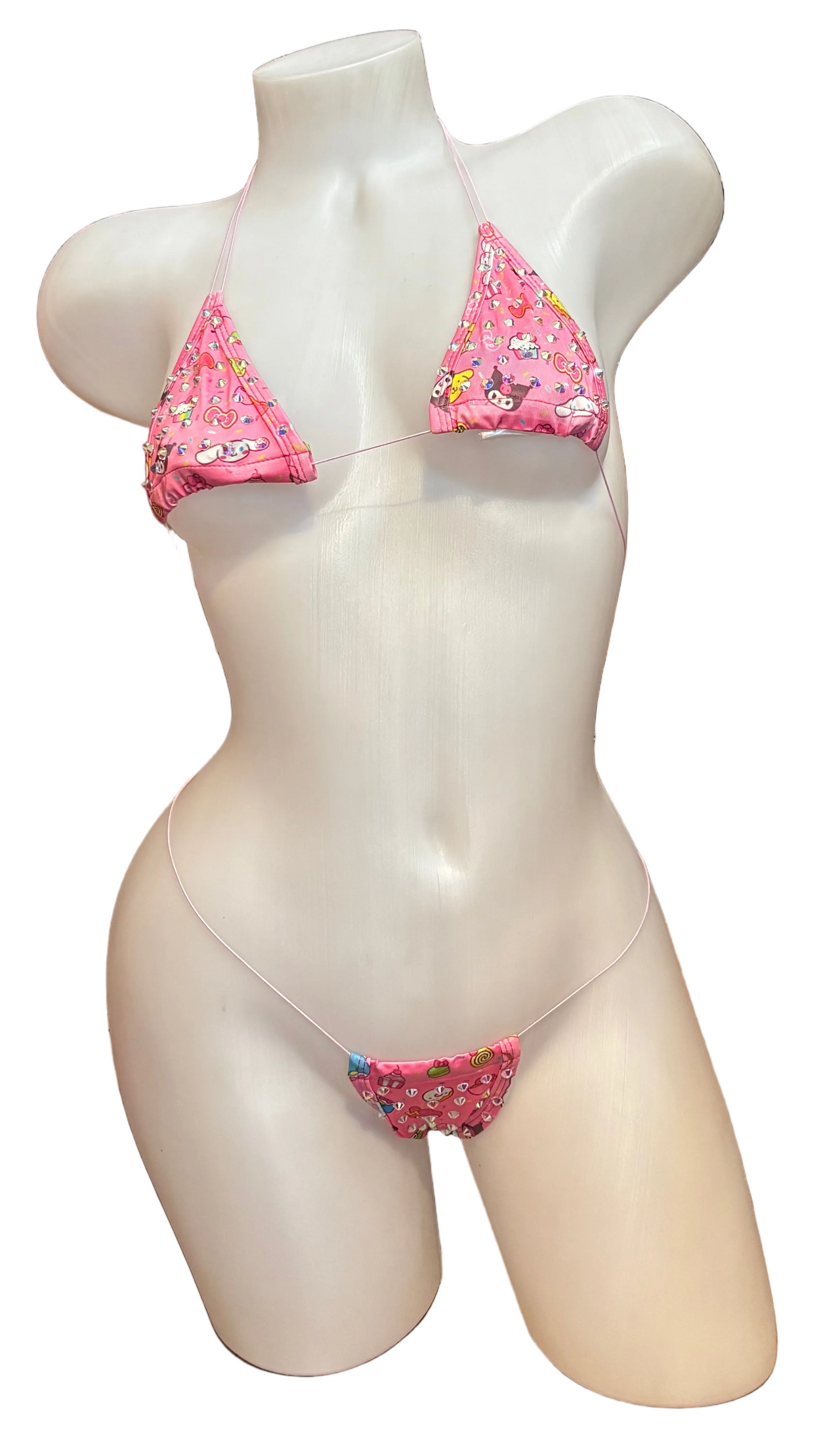 Pink rhinestone micro bikini from BPI featuring sparkling rhinestones and a minimal design, perfect for stylish beachwear.