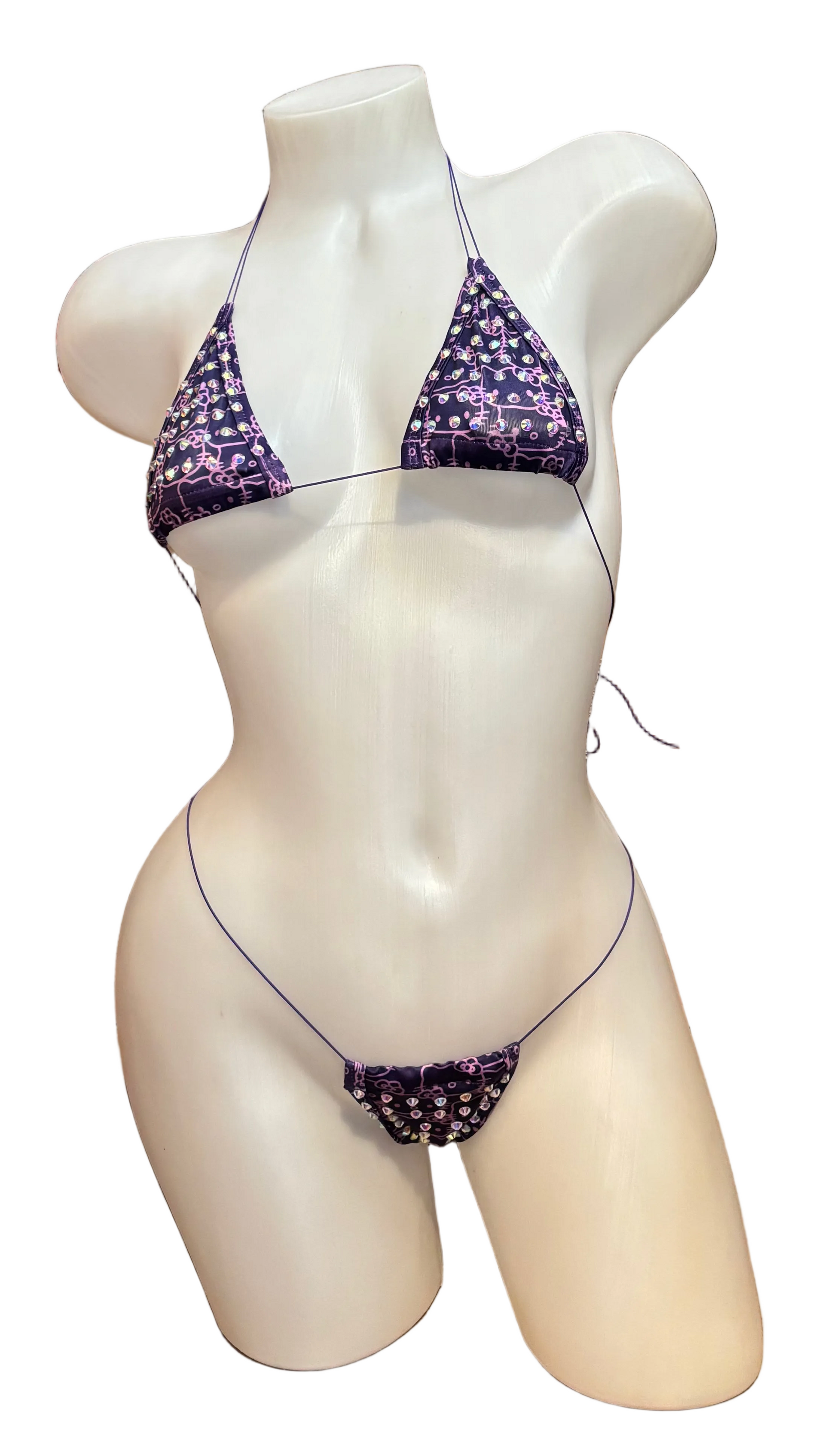 Purple rhinestone Hello Kitty micro bikini by BPI featuring sparkling details and a minimal design for summer wear.