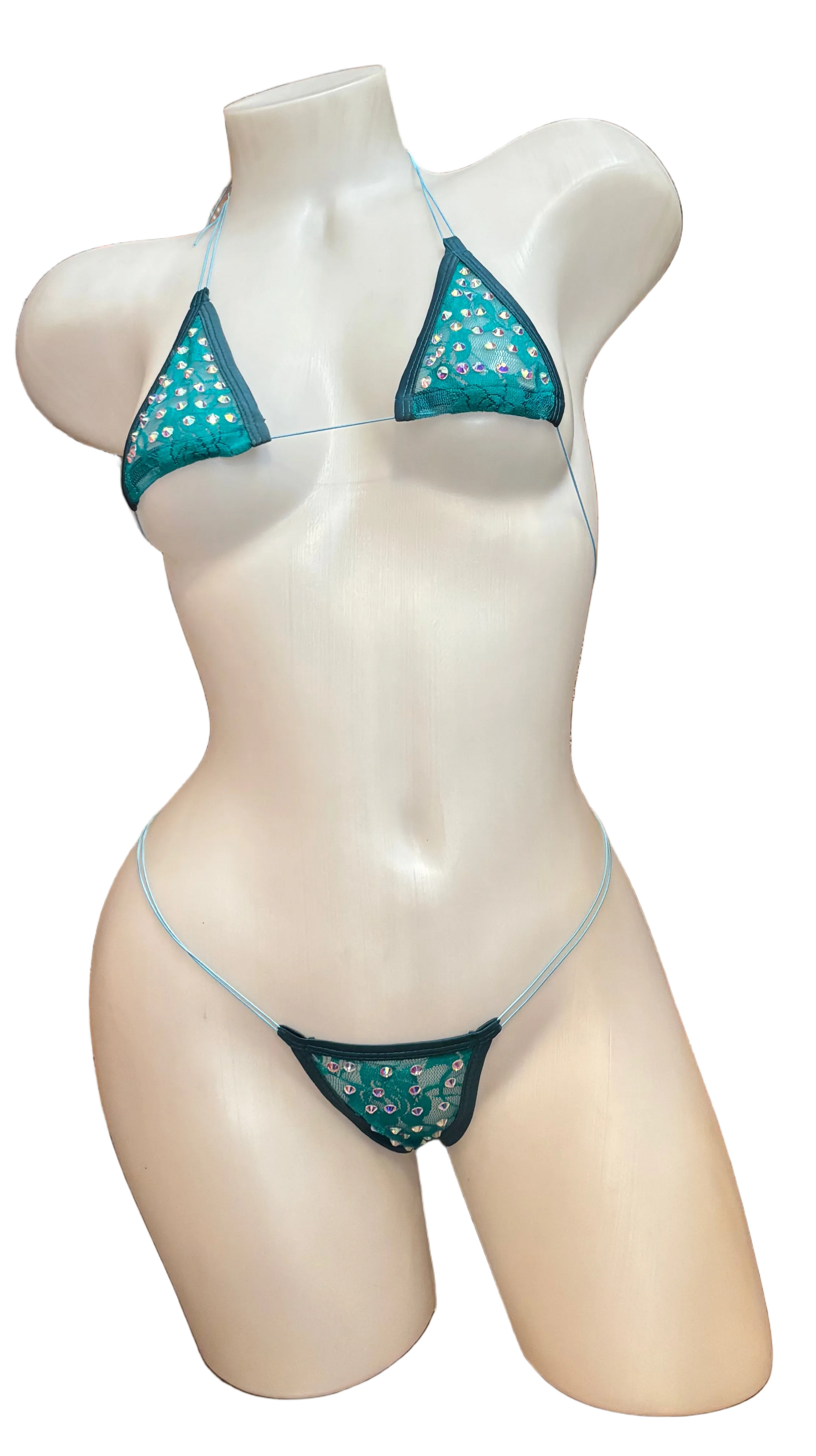 Teal rhinestone micro bikini with lace details from BPI, featuring sparkling rhinestones and delicate lace fabric.